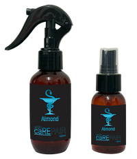 Two bottles of Almond care repair spray on a white background